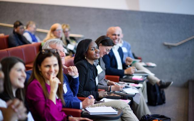 Smiling people in an audience