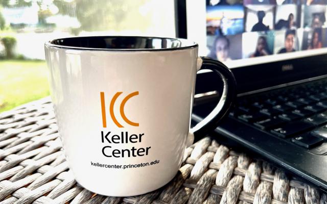 Keller mug next to computer