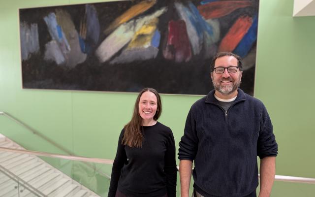 Ellen Eischen and Jordan Ellenberg standing in the Friend Center atrium