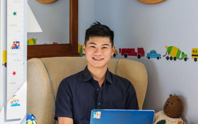 Kevin Hou in his childhood bedroom