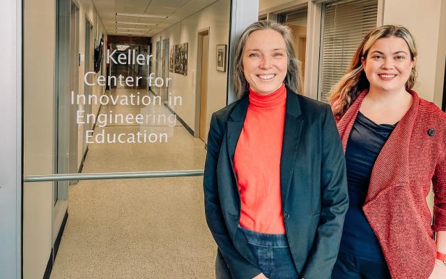 Sigrid Adriaenssens and Janet Vertesi smiling by the doors to the Keller Center