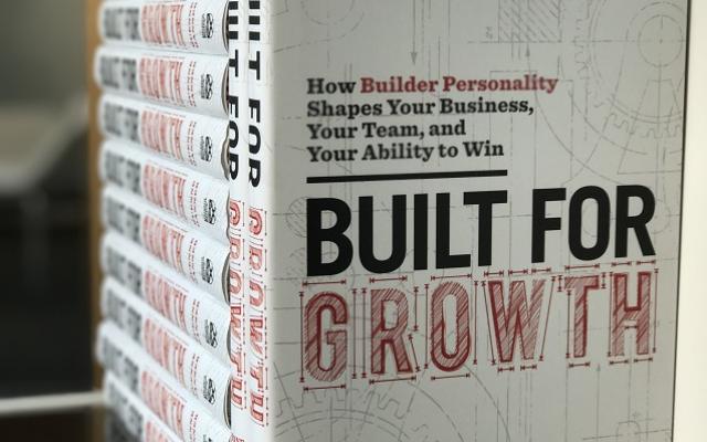 Stack of Built for Growth books