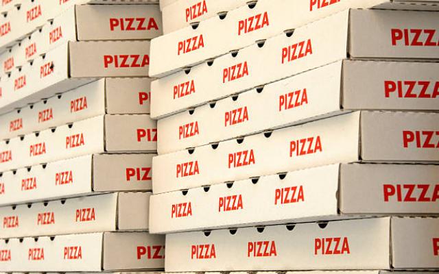 stack of pizza boxes
